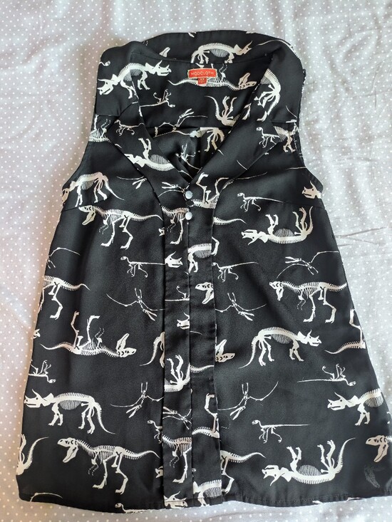 Modcloth Tops - ModCloth Black Button-Up Sleeveless Blouse with White Dinosaur Skeletons